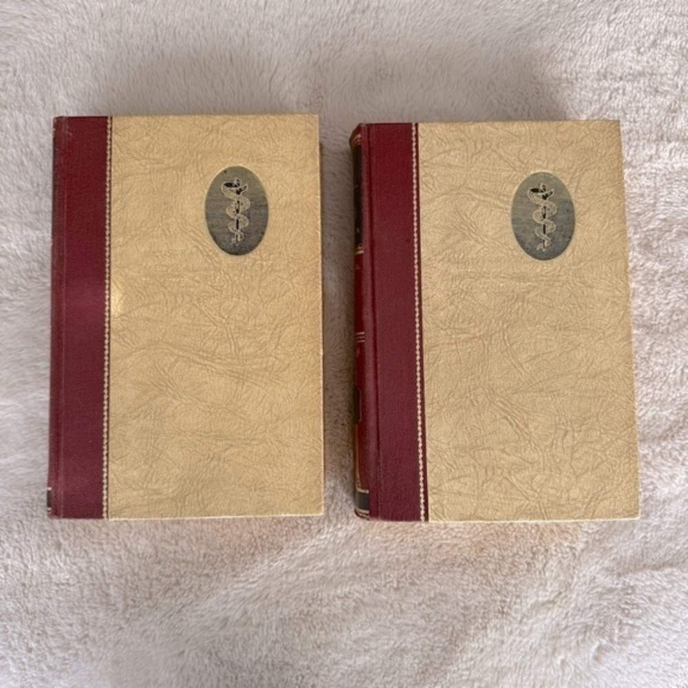 Vintage set of two illustrated medical and health encyclopedia books